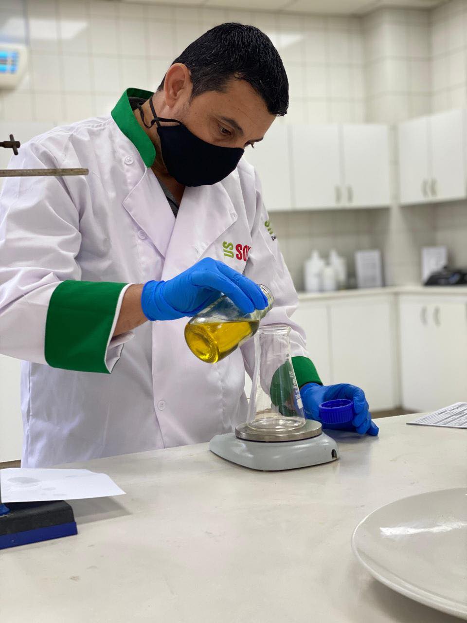 Team member testing vegetable oil in the laboratory