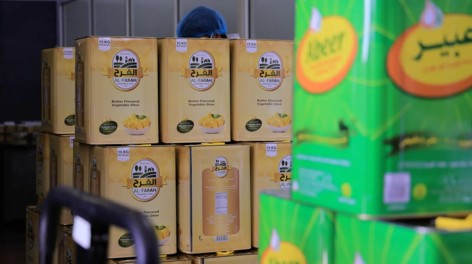 Al-Farah® vegetable ghee tins in storage